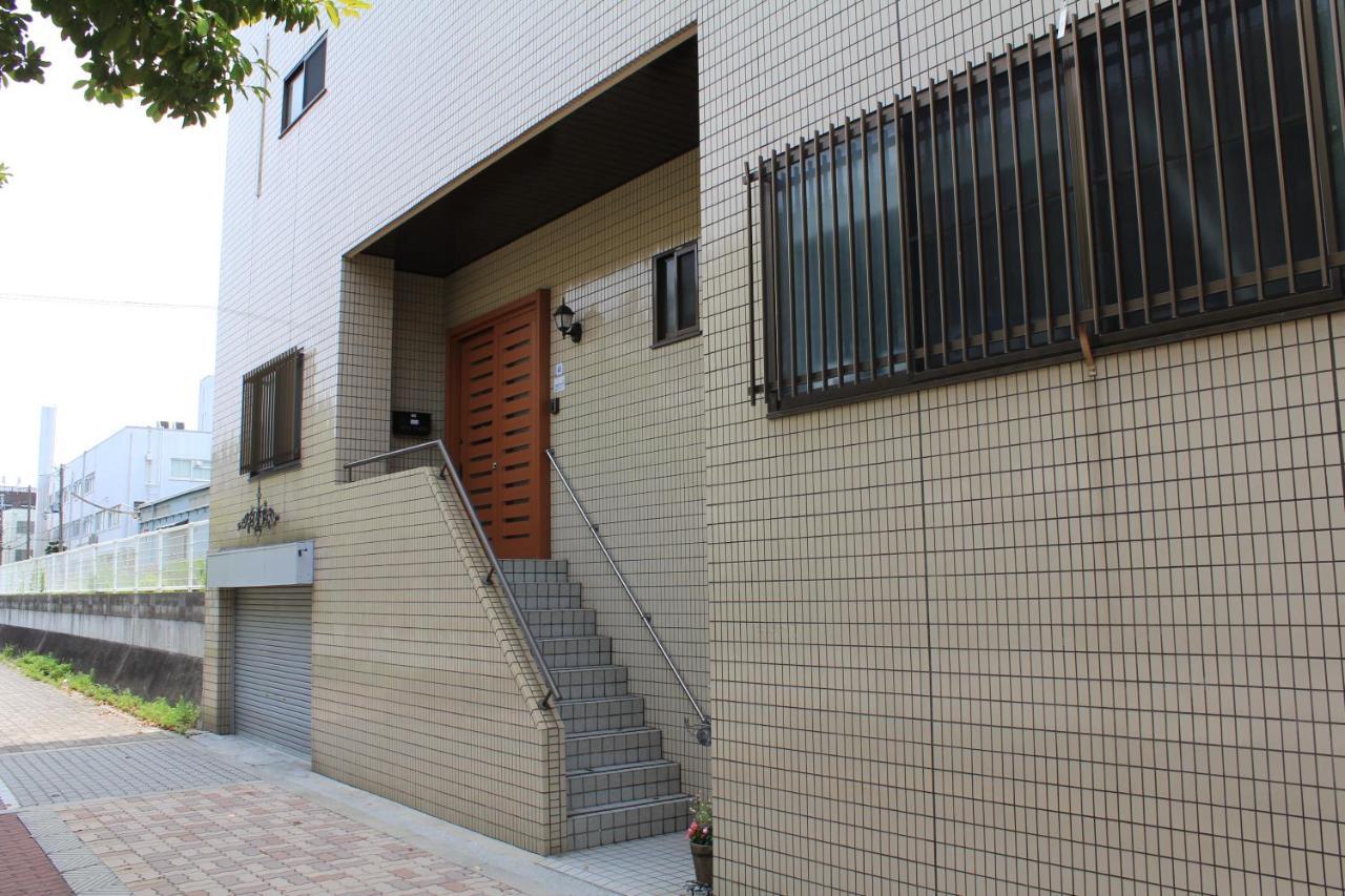 Guest House Apple Ōsaka Exterior foto