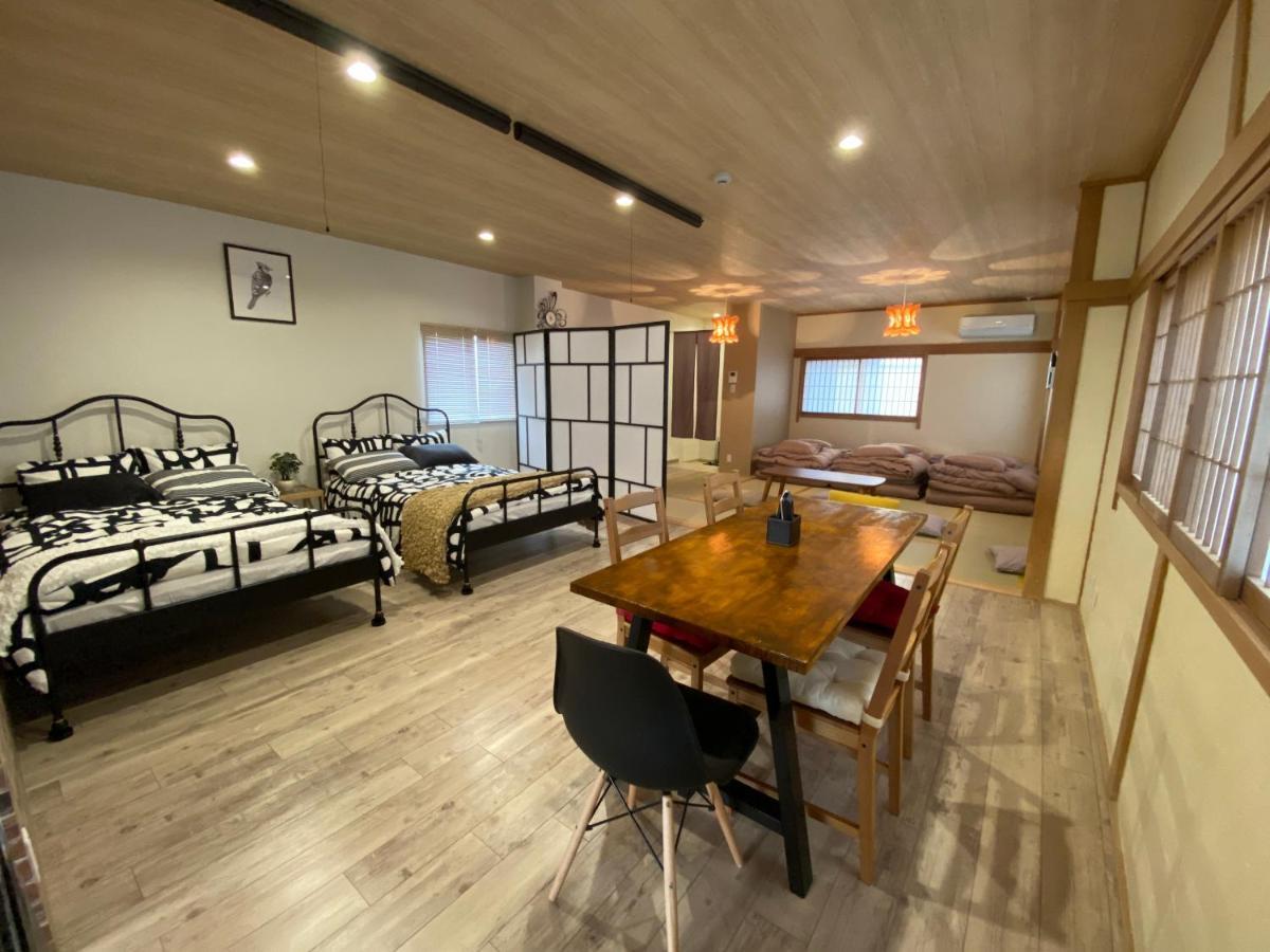 Guest House Apple Ōsaka Exterior foto